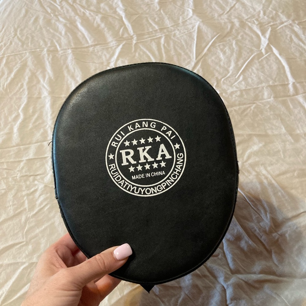 Instructor punching pad